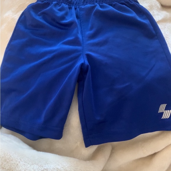 3T boys shirts, yellow hoodie is 2T, black shirt is 2T. To big for my son. - Picture 2 of 16